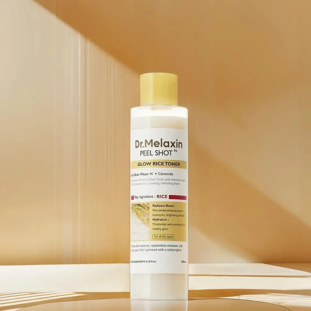 Dr. Melaxin Rice White & Black Soften Serum – Gentle Exfoliating & Deep Moisturizing Essence